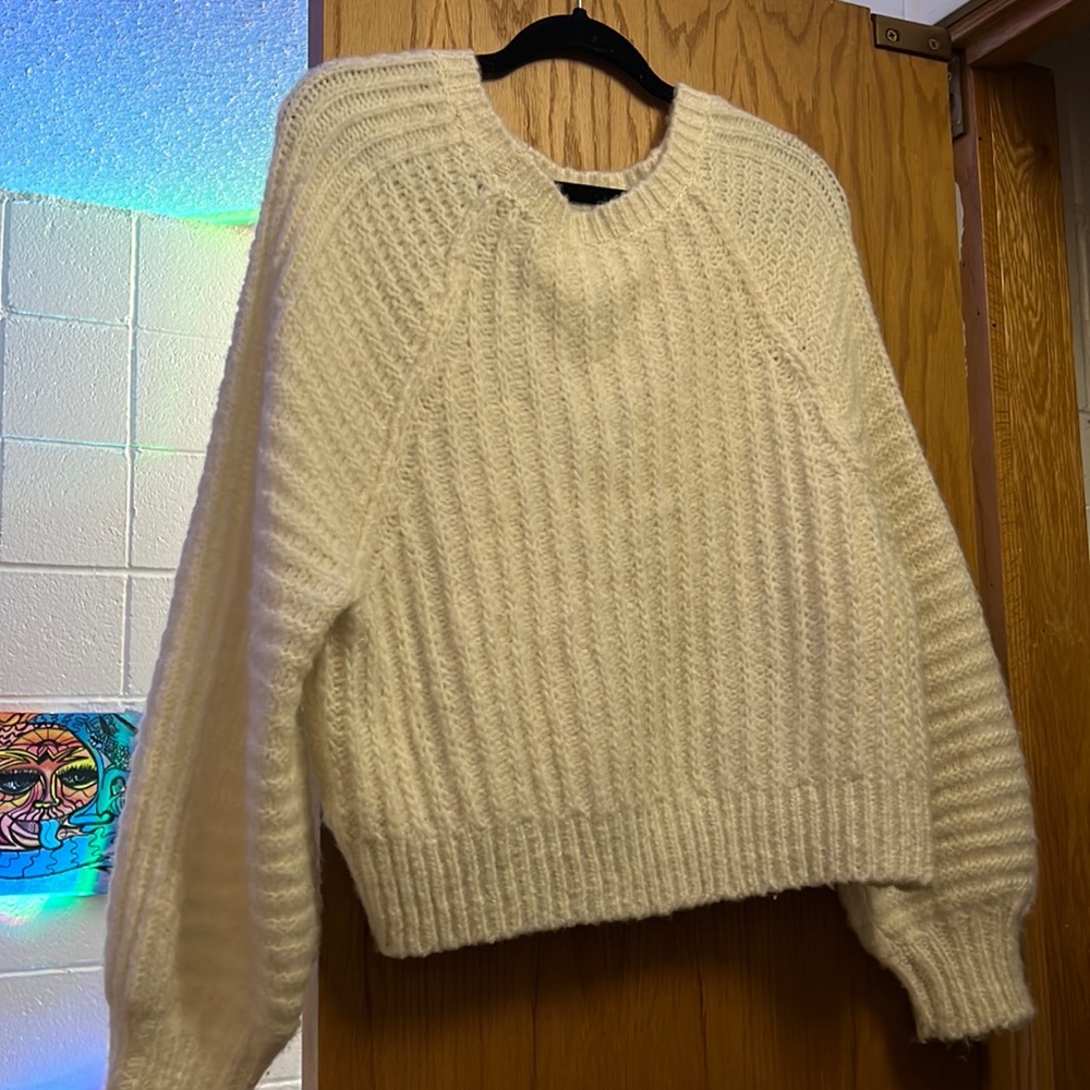 Free People soft yet textured sweater. Too small for me but multipurpose & cute!